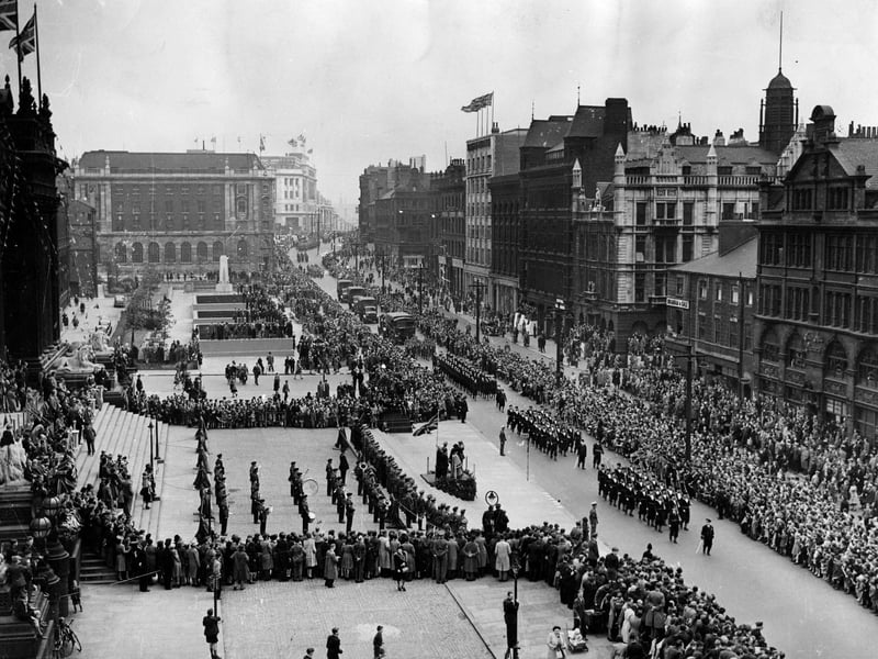 Looking down The Headrow from the corner with Oxford Place, military parade for the opening of Salute the Soldier week. The long procession was headed by the band of the West Yorkshire Regiment, followed by Royal Navy officers and ratings, the W.R.N.S. and the Royal Artillery, who brought several anti-aircraft guns. There were bands from the Northamptonshire Regiment, Army Cadets, Boys' Brigade, A.T.C., Home Guard, Sea Cadets and Civil Defence Messengers.