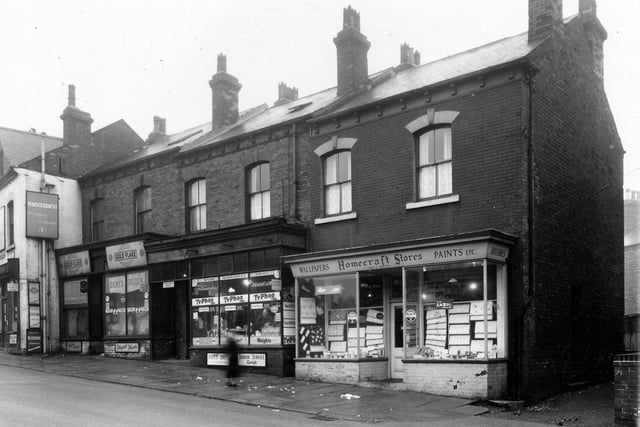 Shops on Hyde Park Road pictured in March 1959. Towards the left is a gents saloon, mens hairdressers at number 52, business of Arthur Fountian. In the centre is a grocers and Continental Food Store at number 50 with D. Carter's Homecraft Stores at number 48. Leeds Grand Mosque now stands on this site.
