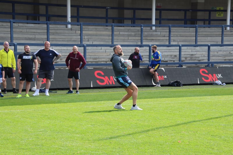 A fan tests his skills at Rhinos' sponsors' training day.
