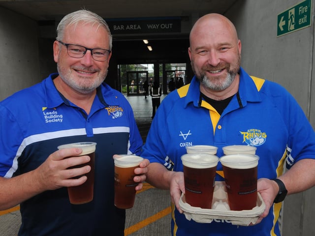 Brothers Mark and Andy Cohen get the beers in before Leeds Rhinos' derby win against Bradford Bulls.