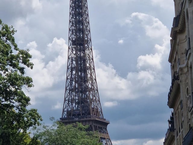 Junaid has visited France and held meetings adjacent to the Eiffel Tower.
