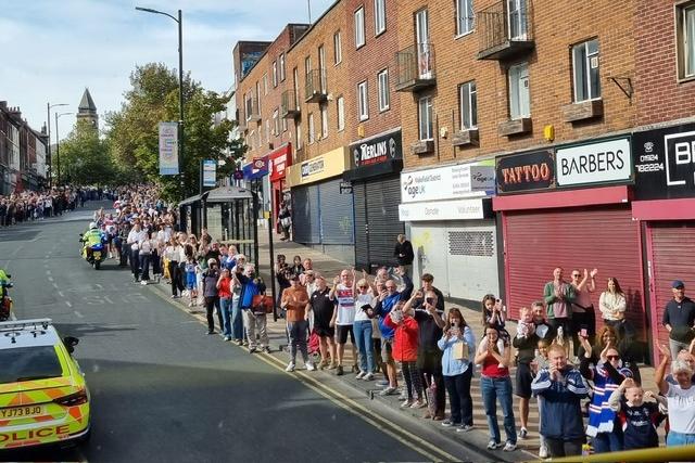 Fans along the route.