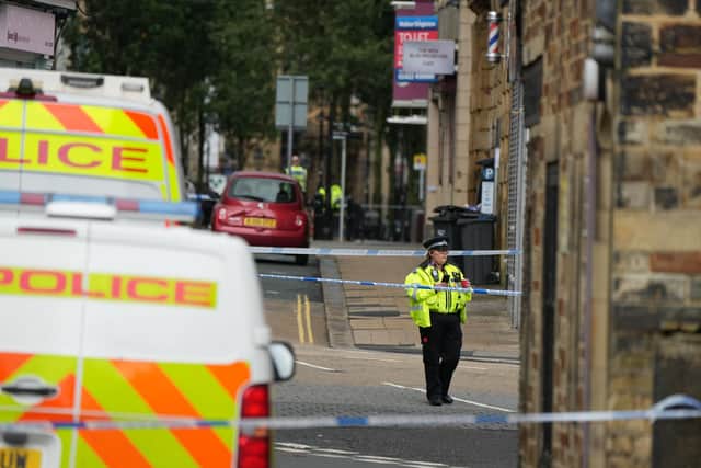 Officers were called to the incident at 3.48am following reports that three men had been assaulted. Photo: Danny Lawson/PA Wire