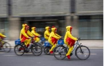 Domino's has gone clucking mad as a flock of delivery drivers dressed as chickens sped through the streets to celebrate the launch of its brand-new offering: CHICK ‘N’ DIP.