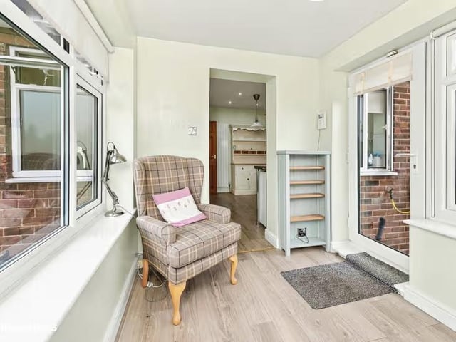 The conservatory provides valuable additional living space and a pleasant connection to the garden.