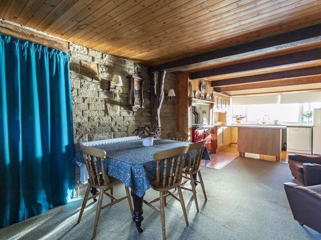 Looking down towards the kitchen from the dining area.