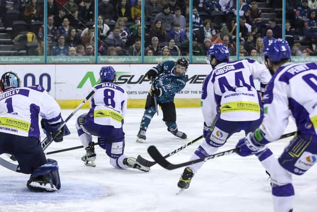 EXPERIENCE: Carter Hamill fires in a shot on the Coventry Blaze goal for Belfast Giants last season, one of four appearances he made for his hometown Elite League team. Picture courtesy of William Cherry/Presseye/EIHL.