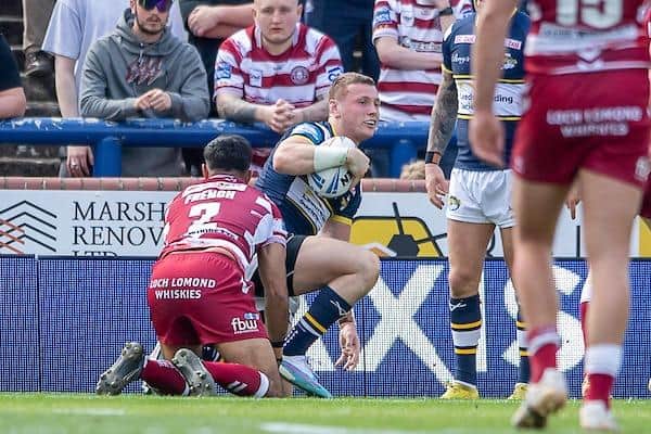Harry Newman scores in Rhinos' Cup defeat by Wigan. Picture by Allan McKenzie/SWpix.com.