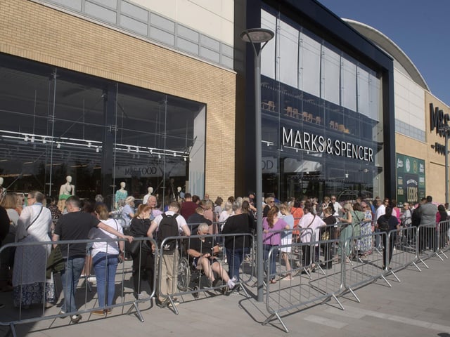 Shoppers queued to get inside ahead of the official unveiling at 10am