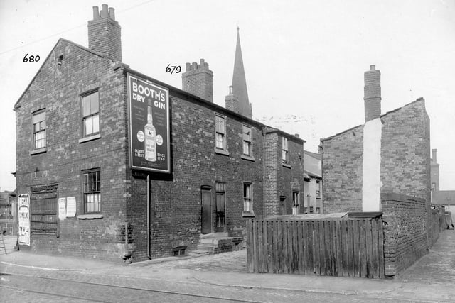 The Balm Road area, showing tram-lines in September 1935. Tate Court with advertisement for Booth's Dry Gin on end of house. A church steeple can be seen in the background.