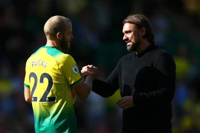 NORWICH, ENGLAND - AUGUST 17: Teemu Pukki of Norwich City shake hands with Daniel Farke, Manager of Norwich City following their sides victory in the Premier League match between Norwich City and Newcastle United at Carrow Road on August 17, 2019 in Norwich, United Kingdom. (Photo by Jordan Mansfield/Getty Images)