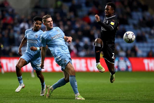 COVENTRY, ENGLAND - NOVEMBER 02: Viktor Gyökeres of Coventry City is challenged by Ethan Laird of Swansea City during the Sky Bet Championship match between Coventry City and Swansea City at The Coventry Building Society Arena on November 02, 2021 in Coventry, England. (Photo by Ryan Pierse/Getty Images)