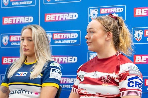 Rhinos' Caitlin Beevers with Mary Coleman of Wigan at a media conference this week to promote Sunday's semi-final. Picture by Allan McKenzie/SWpix.com.