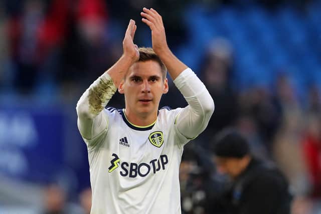 BIG PRAISE: For Leeds United's away fans at Cardiff City from Whites new boy Max Wober, pictured applauding the travelling contingent of 6,500 after Sunday's 2-2 draw. 
Photo by GEOFF CADDICK/AFP via Getty Images.