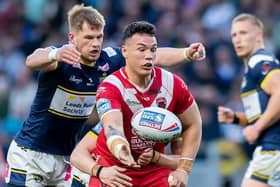 Tom Holroyd tackles Tyler Dupree, now of Wigan, during Rhinos' home clash with Salford in May. Picture by Allan McKenzie/SWpix.com.