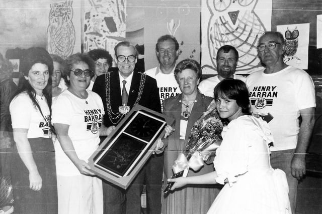 A group photograph taken at the Henry Barran Centre on the occasion of its Golden Anniversary in July 1988. The Lord Mayor, Councillor Arthur Vollans is pictured presenting his gift of an ornamental wall-clock to the Henry Barran Centre Management Committee. Local people were invited to enjoy a buffet meal at 1938 prices, and take part in fun activities and competitions. Pictured, from left, are Linda Bosomworth, Councillor Lorna Cohen, Lily Shackleton, Lord Mayor Councillor Arthur Vollans, Councillor Terry Briggs, the Lady Mayoress, Warden, John Holmes, Eddie Manning and Michelle Houghton, about to present the Lady Mayoress with a bouquet.