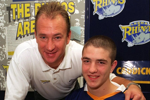 Matt Diskin, pictured with head of youth Dean Bell, signed for Leeds in September, 1998, aged 15. He made his debut in the 2001 season and went on to play in four Grand Final wins.