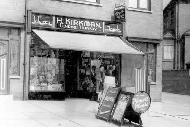 Easterly Road in April 1939 with Herbert Kirkman in focus, a newsagents shop also selling sweets, tobacco and boasting a lending library.