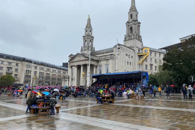 Crowds gather in Millennium Square to watch the Queen's funeral