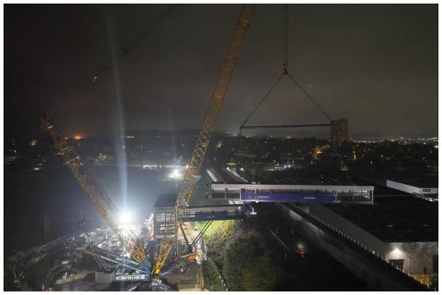 The two link bridges were installed overnight over the course of two weekends by a 1,200-tonne crane. Picture: WYCA