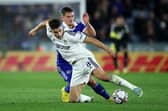 HOOKED: Leeds United midfielder Marc Roca, front, after a first half to forget at Leicester City. Photo by Eddie Keogh/Getty Images.