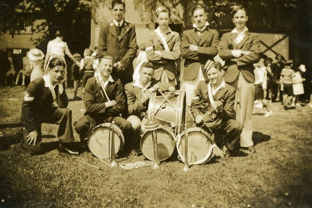 Members of the 8th Leeds Boys Brigade pictured with their musical instruments during Whit Monday celebrations in 1939. The location may be Burley Park, which was located on the opposite side of Cardigan Road to their church, Burley Methodist.