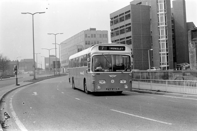 AEC Swift/Park Royal 1012 (1969) bus, registration no SUB 412G on route no 7, destination Hunslet. This is at the junction of Park Lane and the Inner Ring Road in March 1981. Square Building in the centre is Park Lane College, to the right is Concord House.