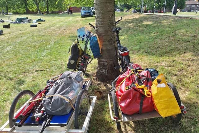 The team travel to community events by bike and loaded trailer