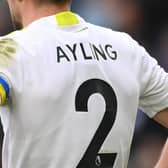 LEICESTER, ENGLAND - MARCH 05: Luke Ayling of Leeds United wears a Ukraine captains armband to indicate peace and sympathy with Ukraine during the Premier League match between Leicester City and Leeds United at The King Power Stadium on March 05, 2022 in Leicester, England. (Photo by Michael Regan/Getty Images)