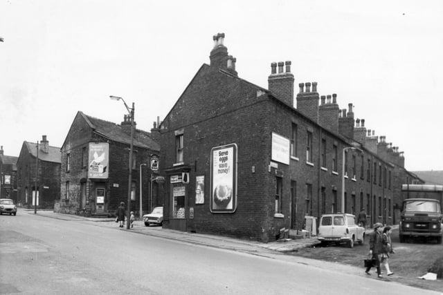 Terraced streets situated off Stanningley Road (seen in the foreground) in Julky 1968. From the left the four streets in view are Waterhouse Terrace, Albert Street, St Thomas Street and Britannia Street. Corner shops and an off licence can be seen at the junction with Stanningley Road.
