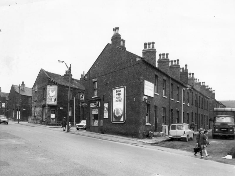 Terraced streets situated off Stanningley Road (seen in the foreground) in Julky 1968. From the left the four streets in view are Waterhouse Terrace, Albert Street, St Thomas Street and Britannia Street. Corner shops and an off licence can be seen at the junction with Stanningley Road.