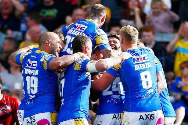 Rhinos players celebrate Rhyse Martin's second try, which sealed the win over Salford. Picture by Matt West/SWpix.com.