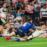 Davy Litten scores for Hull FC against Wakefield Trinity at MKM Stadium in June. Picture by Alex Whitehead/SWpix.com.