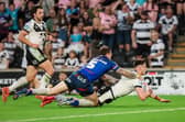 Davy Litten scores for Hull FC against Wakefield Trinity at MKM Stadium in June. Picture by Alex Whitehead/SWpix.com.