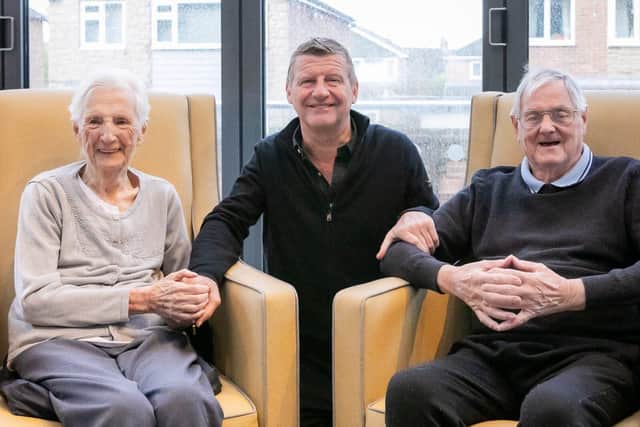 Former carer, Frances Bugg and her husband, John Bugg with CEO of Springfield Healthcare, Graeme Lee