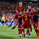 JOY: For Leeds United striker Spain, back centre, celebrating Spain's Nations League final win against Croatia after a penalty shoot out. Photo by JOHN THYS/AFP via Getty Images.