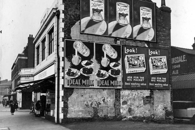 The gable end of Stephenson's shop showing advertisements for Ideal Milk, Libby's Evaporated Milk and Compo Washing Powder. Pictured in September 1934.