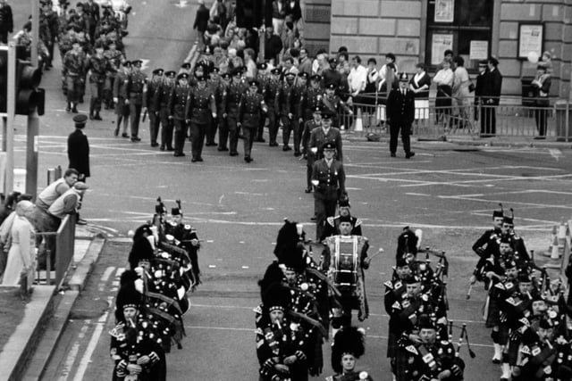 The massed bands of 71, 72 and 74 Engineer Regiments led the 272 (West Riding Artillery) Field Support Squadron as it excercised its freedom of the city of Bradford with a short parade through the city centre in April 1988. A large crowd turned out to see the parade and the Lord Mayor, Coun Laurie Coughlin (Lab, Bowling), take salute outside City Hall as the volunteer squadron marched past.