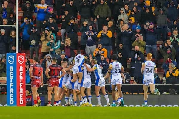 Leeds Rhinos players celebrate Matt Frawley’s try in the comeback win at Leigh Leopards. Picture by Olly Hassell/SWpix.com.