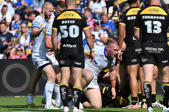 Matt Lodge, kneeling, scored a try on his Leeds Rhinos debut during the 66-16 win at York Knights. Picture by Matthew Merrick/SWpix.com.