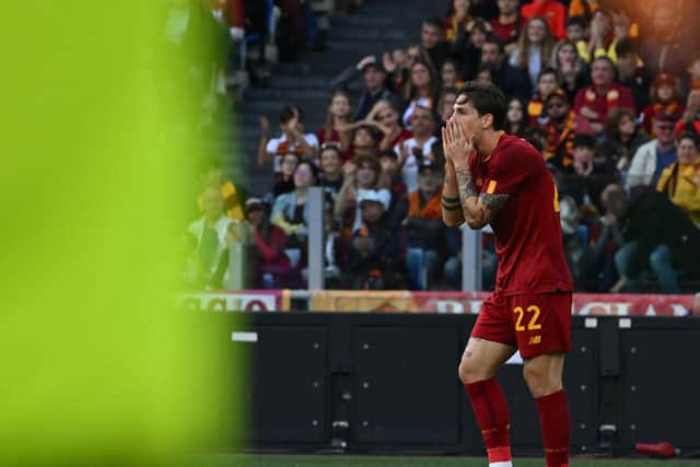 AS Roma's Italian midfielder Nicolo Zaniolo reacts after missing a goal opportunity during the Italian Serie A football match between AS Rome and Torino on November 13, 2022 at the Olympic stadium in Rome. (Photo by Andreas SOLARO / AFP) (Photo by ANDREAS SOLARO/AFP via Getty Images)