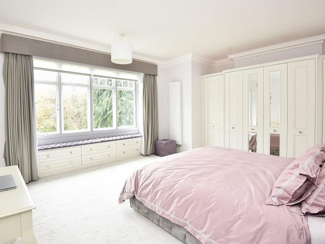 One of the five double bedrooms within the house.