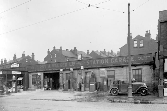 The premises of Hirst and Walker Ltd, station garage on Stanningley Road in April 1937. Workshop with petrol forecourt to front can be seen. Ernest Hallas fruiter can just be seen on left.