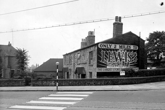 Harrogate Road by the junction with Potternewton Lane in September 1951. The photograph shows the position for hoardings advertising 'Lewis's Department Store', which has been added to the photograph after printing. There is also a notice advertising an FA Cup match between Yorkshire Amateurs and Pilkingtons.