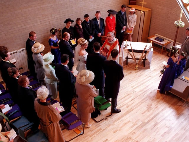 Mark Dunderdale and Michelle Broadbent are married at St. Mary's Church Hall in Garforth in April 1998 following a lightening strike on the church.