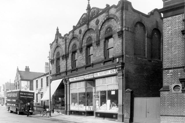 Leeds Industrial Co-operative Society Ltd on Beeston Road in April 1959. The building was purpose built in 1899 as shown by the date stones at the top of the front wall. The initials of the company(L.I.C.S.) can be seen above the second floor windows. This store is a butchers, bakers, confectioners and general store.