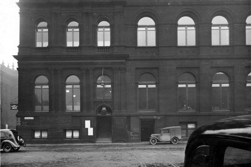 A view looking towards Centenary Street on to Municipal Buildings in December 1936. The building was designed by George Corson and when it opened in 1884 was home to various Civic departments, Police department, Library and Art Gallery (opened in 1888).