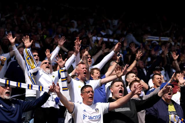 LEEDS, ENGLAND - MAY 15: Fans of Leeds United react in the crowd during the Premier League match between Leeds United and Brighton & Hove Albion at Elland Road on May 15, 2022 in Leeds, England. (Photo by George Wood/Getty Images)