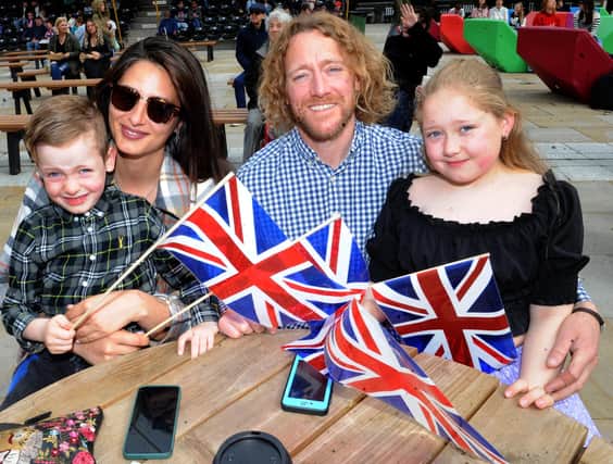 Andy Llewellwn and Billy, six and Elsie, 10, with Lara Gracia flying the flag for Britain.