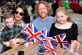 Andy Llewellwn and Billy, six and Elsie, 10, with Lara Gracia flying the flag for Britain.
